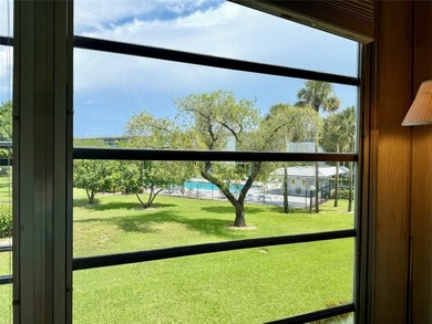 ACTIVE 55+ community! Bright 2nd floor home w/pool view. Receive on Wynmoor Golf Course in Florida - for sale on GolfHomes.com, golf home, golf lot