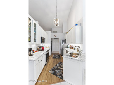 Care and consideration has gone into this beautifully updated on Sea Trail Golf Resort in North Carolina - for sale on GolfHomes.com, golf home, golf lot
