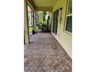 THIS HOME IS A GREAT BUY & READY FOR YOU IN THE GATED PREMIER on Caloosa Greens Executive Golf Course in Florida - for sale on GolfHomes.com, golf home, golf lot