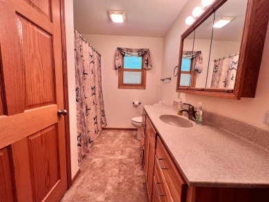 Custom Lake McConaughy Retreat Discover your dream lake getaway on Bayside Golf Course in Nebraska - for sale on GolfHomes.com, golf home, golf lot