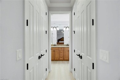 GOLF MEMBERSHIP INCLUDED! Escape to a serene, sun-kissed home on Bonita National Golf Course in Florida - for sale on GolfHomes.com, golf home, golf lot