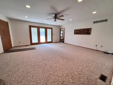 Custom Lake McConaughy Retreat Discover your dream lake getaway on Bayside Golf Course in Nebraska - for sale on GolfHomes.com, golf home, golf lot