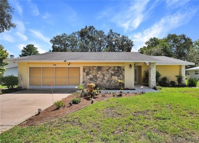 Long driveway and a majestic oak tree lead to this 3 bedroom 2 on Sugarmill Woods Golf and Country Club in Florida - for sale on GolfHomes.com, golf home, golf lot