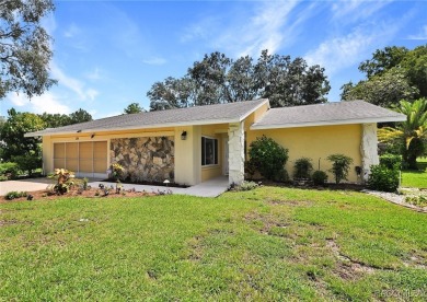 Long driveway and a majestic oak tree lead to this 3 bedroom 2 on Sugarmill Woods Golf and Country Club in Florida - for sale on GolfHomes.com, golf home, golf lot