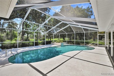 Long driveway and a majestic oak tree lead to this 3 bedroom 2 on Sugarmill Woods Golf and Country Club in Florida - for sale on GolfHomes.com, golf home, golf lot