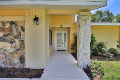 Long driveway and a majestic oak tree lead to this 3 bedroom 2 on Sugarmill Woods Golf and Country Club in Florida - for sale on GolfHomes.com, golf home, golf lot