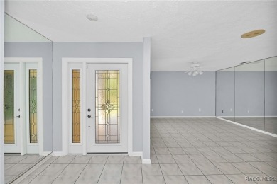 Long driveway and a majestic oak tree lead to this 3 bedroom 2 on Sugarmill Woods Golf and Country Club in Florida - for sale on GolfHomes.com, golf home, golf lot