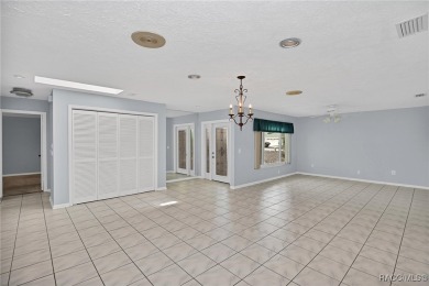 Long driveway and a majestic oak tree lead to this 3 bedroom 2 on Sugarmill Woods Golf and Country Club in Florida - for sale on GolfHomes.com, golf home, golf lot
