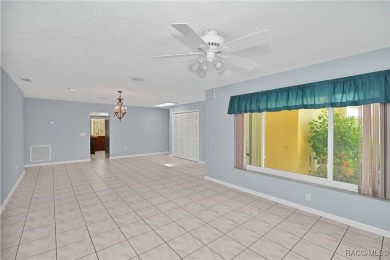 Long driveway and a majestic oak tree lead to this 3 bedroom 2 on Sugarmill Woods Golf and Country Club in Florida - for sale on GolfHomes.com, golf home, golf lot