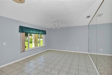 Long driveway and a majestic oak tree lead to this 3 bedroom 2 on Sugarmill Woods Golf and Country Club in Florida - for sale on GolfHomes.com, golf home, golf lot