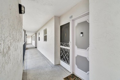 Step inside this beautiful, spacious 4th floor apartment and you on Poinciana Golf Club in Florida - for sale on GolfHomes.com, golf home, golf lot