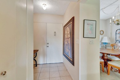 Step inside this beautiful, spacious 4th floor apartment and you on Poinciana Golf Club in Florida - for sale on GolfHomes.com, golf home, golf lot