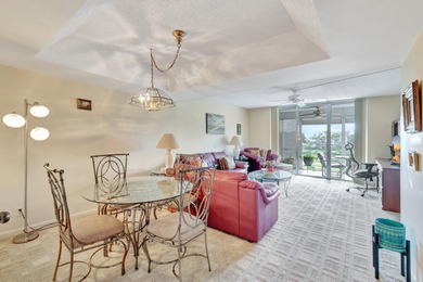 Step inside this beautiful, spacious 4th floor apartment and you on Poinciana Golf Club in Florida - for sale on GolfHomes.com, golf home, golf lot