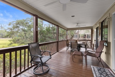 Overlooking the ever-changing tidal marsh, this charming on The Seabrook Island Club in South Carolina - for sale on GolfHomes.com, golf home, golf lot