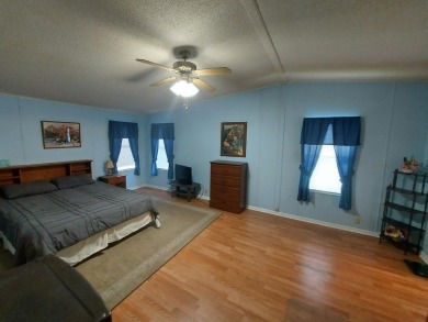 Air conditioned lanai & screened in porch are 2 ways to enjoy on Lakes at Leesburg Golf Course in Florida - for sale on GolfHomes.com, golf home, golf lot