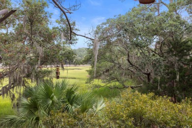 Overlooking the ever-changing tidal marsh, this charming on The Seabrook Island Club in South Carolina - for sale on GolfHomes.com, golf home, golf lot