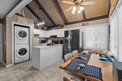 Overlooking the ever-changing tidal marsh, this charming on The Seabrook Island Club in South Carolina - for sale on GolfHomes.com, golf home, golf lot