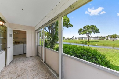 Enjoy every day in this ground-floor golf & lakeview condo in on Kings Point Golf -Flanders Way in Florida - for sale on GolfHomes.com, golf home, golf lot