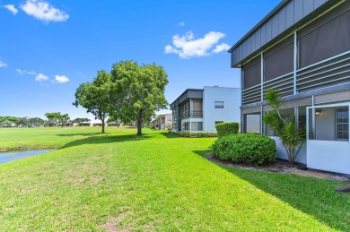Enjoy every day in this ground-floor golf & lakeview condo in on Kings Point Golf -Flanders Way in Florida - for sale on GolfHomes.com, golf home, golf lot