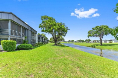 Enjoy every day in this ground-floor golf & lakeview condo in on Kings Point Golf -Flanders Way in Florida - for sale on GolfHomes.com, golf home, golf lot