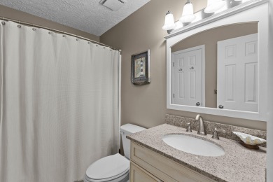 Overlooking the ever-changing tidal marsh, this charming on The Seabrook Island Club in South Carolina - for sale on GolfHomes.com, golf home, golf lot