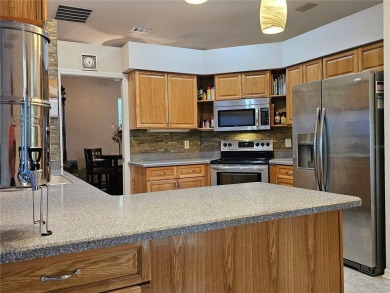 Welcome Home! This lovely private residence features two on Plantation Golf Club in Florida - for sale on GolfHomes.com, golf home, golf lot