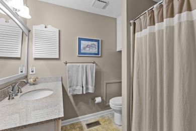 Overlooking the ever-changing tidal marsh, this charming on The Seabrook Island Club in South Carolina - for sale on GolfHomes.com, golf home, golf lot