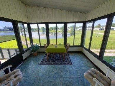 Air conditioned lanai & screened in porch are 2 ways to enjoy on Lakes at Leesburg Golf Course in Florida - for sale on GolfHomes.com, golf home, golf lot