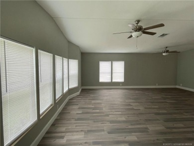 TOTALLY REMODELED! The kitchen cabinets with soft close doors on Indianwood Golf and Country Club in Florida - for sale on GolfHomes.com, golf home, golf lot