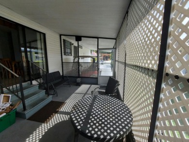 Air conditioned lanai & screened in porch are 2 ways to enjoy on Lakes at Leesburg Golf Course in Florida - for sale on GolfHomes.com, golf home, golf lot