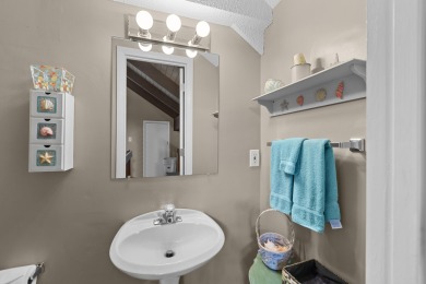 Overlooking the ever-changing tidal marsh, this charming on The Seabrook Island Club in South Carolina - for sale on GolfHomes.com, golf home, golf lot