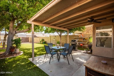 Welcome to this charming 3-bedroom, 2.5-bath home nestled in the on Apache Wells Country Club in Arizona - for sale on GolfHomes.com, golf home, golf lot