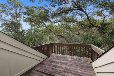Overlooking the ever-changing tidal marsh, this charming on The Seabrook Island Club in South Carolina - for sale on GolfHomes.com, golf home, golf lot