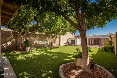 Welcome to this charming 3-bedroom, 2.5-bath home nestled in the on Apache Wells Country Club in Arizona - for sale on GolfHomes.com, golf home, golf lot