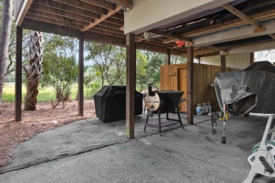 Overlooking the ever-changing tidal marsh, this charming on The Seabrook Island Club in South Carolina - for sale on GolfHomes.com, golf home, golf lot