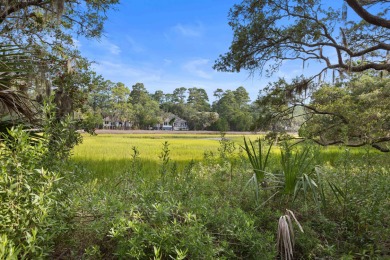 Overlooking the ever-changing tidal marsh, this charming on The Seabrook Island Club in South Carolina - for sale on GolfHomes.com, golf home, golf lot