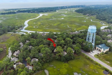 Overlooking the ever-changing tidal marsh, this charming on The Seabrook Island Club in South Carolina - for sale on GolfHomes.com, golf home, golf lot