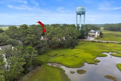 Overlooking the ever-changing tidal marsh, this charming on The Seabrook Island Club in South Carolina - for sale on GolfHomes.com, golf home, golf lot