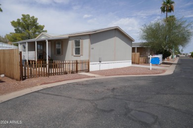 Move-in ready and spacious, this multi-wide home in Shamrock on Desert Mirage Golf Course in Arizona - for sale on GolfHomes.com, golf home, golf lot