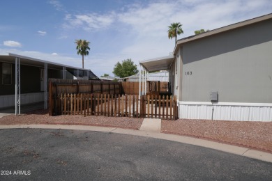 Move-in ready and spacious, this multi-wide home in Shamrock on Desert Mirage Golf Course in Arizona - for sale on GolfHomes.com, golf home, golf lot