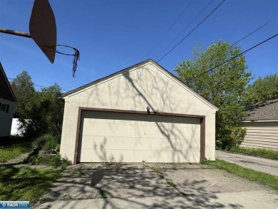 Discover this charming 3-bed, 2.75-bath gem overlooking the lush on Virginia Golf Course in Minnesota - for sale on GolfHomes.com, golf home, golf lot