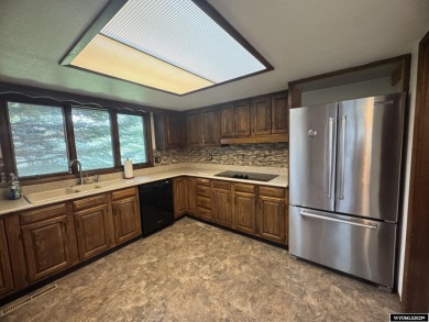 This place offers the Riverton golf course as your back yard! on Riverton Country Club in Wyoming - for sale on GolfHomes.com, golf home, golf lot