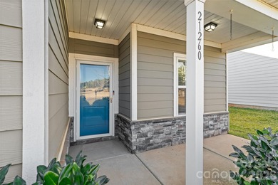 Welcome to this beautifully designed 3-bedroom, 3-bath home on Edgewater Golf Club in South Carolina - for sale on GolfHomes.com, golf home, golf lot