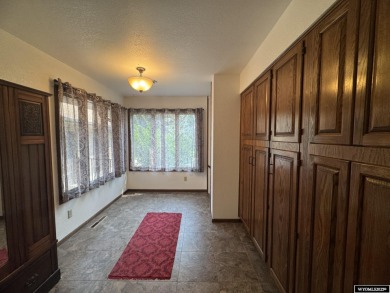 This place offers the Riverton golf course as your back yard! on Riverton Country Club in Wyoming - for sale on GolfHomes.com, golf home, golf lot