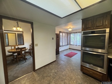 This place offers the Riverton golf course as your back yard! on Riverton Country Club in Wyoming - for sale on GolfHomes.com, golf home, golf lot