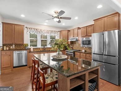 Welcome to this charming single-family home located in the on Canongate Golf At Sun City Peachtree in Georgia - for sale on GolfHomes.com, golf home, golf lot