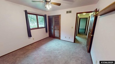 This place offers the Riverton golf course as your back yard! on Riverton Country Club in Wyoming - for sale on GolfHomes.com, golf home, golf lot