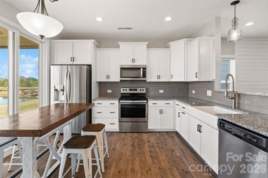 Welcome to this beautifully designed 3-bedroom, 3-bath home on Edgewater Golf Club in South Carolina - for sale on GolfHomes.com, golf home, golf lot