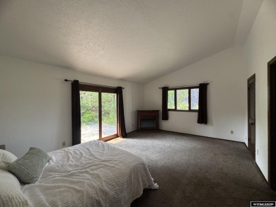 This place offers the Riverton golf course as your back yard! on Riverton Country Club in Wyoming - for sale on GolfHomes.com, golf home, golf lot