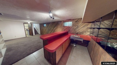 This place offers the Riverton golf course as your back yard! on Riverton Country Club in Wyoming - for sale on GolfHomes.com, golf home, golf lot
